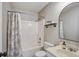 Bathroom featuring a shower-tub combo and vanity with a decorative mirror and fixtures at 309 Edinburgh St, Summerville, SC 29483