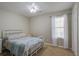 Serene bedroom with natural light, carpet, and a comfortable bed; a calm retreat at 309 Edinburgh St, Summerville, SC 29483