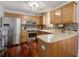 Beautiful kitchen featuring stainless steel appliances, wooden cabinets, and stylish backsplash at 309 Edinburgh St, Summerville, SC 29483