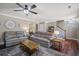 Spacious living room with two sofas, two end tables, rustic coffee table and hardwood floors at 309 Edinburgh St, Summerville, SC 29483