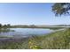 Calm waterfront views with dock at 410 E Indian Ave, Folly Beach, SC 29439