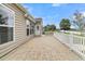 Back patio overlooking a scenic pond with a fountain at 418 Eastern Isle Ave, Summerville, SC 29486