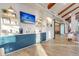 Stylish bar area with sleek blue cabinetry, modern fixtures, and convenient amenities at 418 Eastern Isle Ave, Summerville, SC 29486