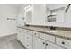 Elegant bathroom with granite countertops, dual sinks, and white cabinets at 418 Eastern Isle Ave, Summerville, SC 29486
