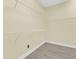 Walk-in closet with wire shelving and gray vinyl plank flooring at 418 Eastern Isle Ave, Summerville, SC 29486