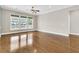 Spacious living room with large windows providing natural light and an outdoor view at 418 Eastern Isle Ave, Summerville, SC 29486