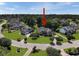 Stunning aerial view of a well-manicured home surrounded by lush greenery at 4218 Club Course Dr, North Charleston, SC 29420