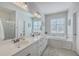 This bathroom offers double sinks, soaking tub and separate shower at 4218 Club Course Dr, North Charleston, SC 29420