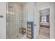 Bathroom with glass enclosed shower, storage cabinet and natural light at 4218 Club Course Dr, North Charleston, SC 29420