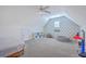 Well lit attic bedroom featuring a window, neutral paint and carpet, with an activity area at 4218 Club Course Dr, North Charleston, SC 29420