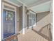 Charming front porch featuring a welcoming entryway, stylish decor, and a covered area at 4218 Club Course Dr, North Charleston, SC 29420