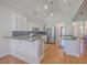 Bright eat-in kitchen with stainless steel appliances, granite countertops, and a breakfast bar at 4218 Club Course Dr, North Charleston, SC 29420
