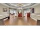 Wide lobby with elegant furnishings, tile flooring, and access to various rooms at 4218 Club Course Dr, North Charleston, SC 29420