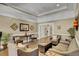 Comfortable lounge area with seating, stylish decor, and plenty of natural light at 4218 Club Course Dr, North Charleston, SC 29420