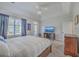 Bright main bedroom with large windows, television and access to outdoor living at 4218 Club Course Dr, North Charleston, SC 29420