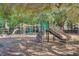 Community playground with slides, climbing structures, and swings, designed for of all ages at 4218 Club Course Dr, North Charleston, SC 29420