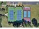 Aerial view of the tennis courts and sports courts showing the layout and pristine condition at 4218 Club Course Dr, North Charleston, SC 29420