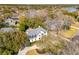 Aerial view of a grand two-story home surrounded by mature trees, offering privacy and charm at 442 Channel Creek Ct, Mount Pleasant, SC 29464