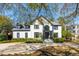 Charming two-story home with a well-manicured lawn and a circular driveway at 442 Channel Creek Ct, Mount Pleasant, SC 29464