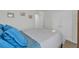 Bright bedroom with neutral carpet, closet with double doors, and blue duvet at 446 White Scallop Way, Summerville, SC 29486