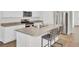 Open concept kitchen with a large island and barstool seating at 446 White Scallop Way, Summerville, SC 29486