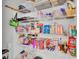 Organized pantry showcasing shelving stocked with a variety of food items and household supplies at 446 White Scallop Way, Summerville, SC 29486