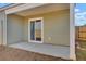 Covered patio with concrete slab and tan siding at 446 White Scallop Way, Summerville, SC 29486