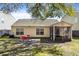 Backyard featuring a patio set and sunroom with outdoor views at 5024 Blair Rd, Summerville, SC 29483