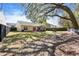 Large backyard with patio, grill, screened porch and ample room for outdoor activities at 5024 Blair Rd, Summerville, SC 29483