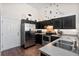 Contemporary kitchen with stainless steel appliances and dark cabinetry at 5024 Blair Rd, Summerville, SC 29483