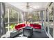 Sunroom featuring a wicker sofa and outdoor views at 5024 Blair Rd, Summerville, SC 29483