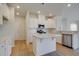 New kitchen with white cabinets, stainless appliances, granite countertops, and eat-in island at 513 Verdi Dr, Summerville, SC 29486