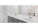 Elegant bathroom with double sinks, granite countertops, and modern fixtures at 519 Verdi Dr, Summerville, SC 29486