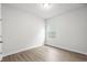Bedroom with neutral paint, modern floors, and natural light coming from the window at 657 Cottage Landing Dr, Summerville, SC 29485