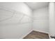 An organized closet featuring white wire shelving and neutral walls at 657 Cottage Landing Dr, Summerville, SC 29485