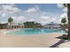 This community pool boasts a beach entry and has an expansive pool deck with pergolas for relaxing at 657 Cottage Landing Dr, Summerville, SC 29485