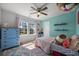 Bright bedroom with a light blue wall color and a colorful rug at 707 Redbud Ln, Summerville, SC 29486