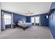 Spacious bedroom featuring a ceiling fan and ample natural light at 707 Redbud Ln, Summerville, SC 29486