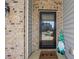 Cozy entrance featuring a decorative gnome and an inviting front door, creating a welcoming ambiance at 707 Redbud Ln, Summerville, SC 29486