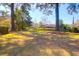 Scenic backyard featuring mature trees and waterfront access at 709 Chatter Rd, Mount Pleasant, SC 29464