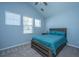 Cozy bedroom featuring two windows letting in natural light and a bed with matching colored coverings at 718 Kilarney Rd, Summerville, SC 29483