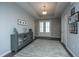 Elegant foyer with tray ceilings, hardwood floors, decor and a gray cabinet at 718 Kilarney Rd, Summerville, SC 29483