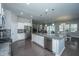 Modern kitchen with granite countertops, stainless appliances, and white cabinets at 718 Kilarney Rd, Summerville, SC 29483