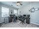 Bright office space with dual desks, carpet, ceiling fan, and two windows at 718 Kilarney Rd, Summerville, SC 29483