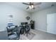 Bright office space with dual desks, carpet, ceiling fan, printer and filing cabinet at 718 Kilarney Rd, Summerville, SC 29483