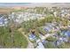 An aerial view of a residential neighborhood with marsh views, showcasing the home's location at 724 Hibbens Grant Blvd, Mount Pleasant, SC 29464