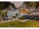 Beautiful backyard featuring a patio with seating, manicured landscaping, and a cozy atmosphere at 724 Hibbens Grant Blvd, Mount Pleasant, SC 29464