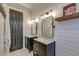 Stylish bathroom featuring double vanities, modern fixtures, and elegant design elements at 724 Hibbens Grant Blvd, Mount Pleasant, SC 29464