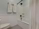 Bright bathroom features white subway tiles, a tub and shower combo, with black fixtures at 724 Hibbens Grant Blvd, Mount Pleasant, SC 29464