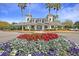 A welcoming clubhouse featuring well-maintained landscaping and a grand entrance at 724 Hibbens Grant Blvd, Mount Pleasant, SC 29464